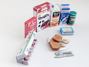 Start your doll’s day with this 1:6 scale 7-piece Miniature Breakfast Printable set! Featuring DIY mini boxes of milk, bread, pancakes, eggs, orange juice, cereal, and butter, it’s a must-have for miniature lovers and dollhouse enthusiasts.