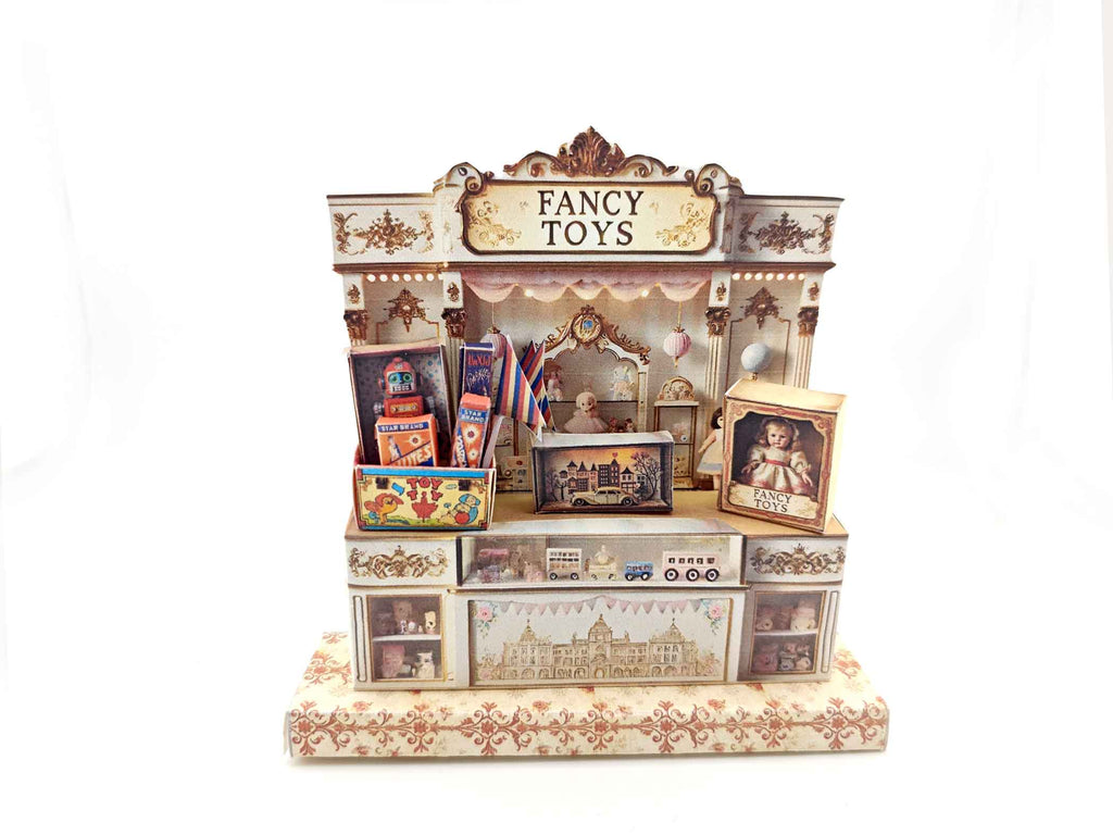 Vintage toy shop stand with miniature doll, robot, car, and fireworks, designed for collectible or dollhouse display