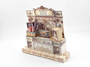 Vintage toy shop stand with miniature doll, robot, car, and fireworks, designed for collectible or dollhouse display