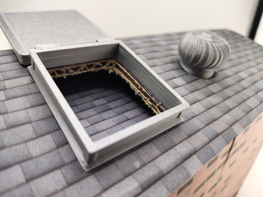 The most compelling miniature scenes rely on interactive, functional details that mirror the real world. This artist-crafted roof hatch features a fully working hinge design, allowing the textured protective lid to swing open or closed.