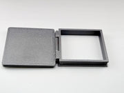 The most compelling miniature scenes rely on interactive, functional details that mirror the real world. This artist-crafted roof hatch features a fully working hinge design, allowing the textured protective lid to swing open or closed.