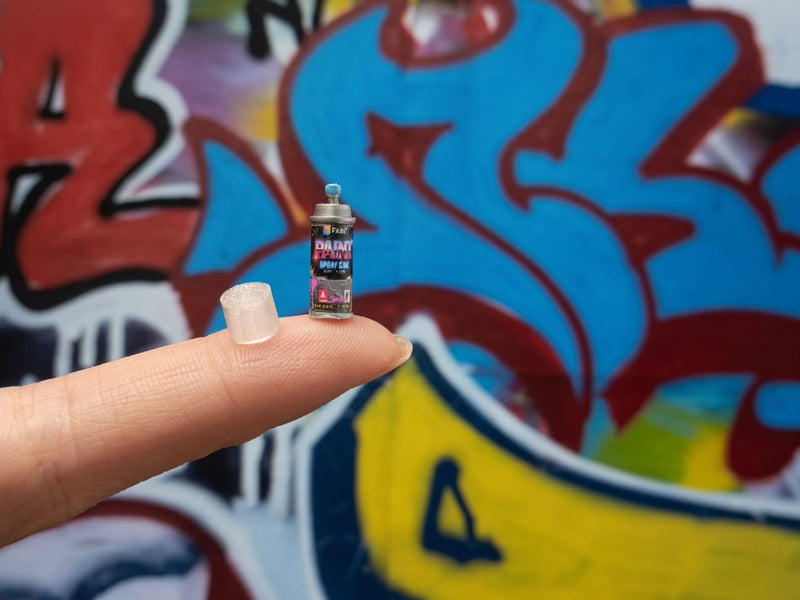 blue paint spray bottle easily brighten up your miniature displays.