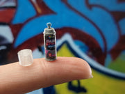 blue paint spray bottle easily brighten up your miniature displays.