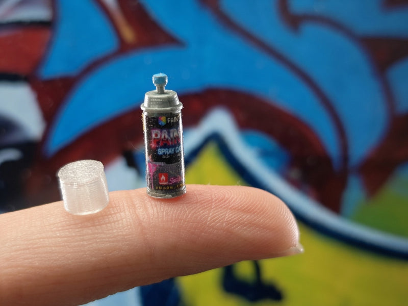 blue paint spray bottle easily brighten up your miniature displays.