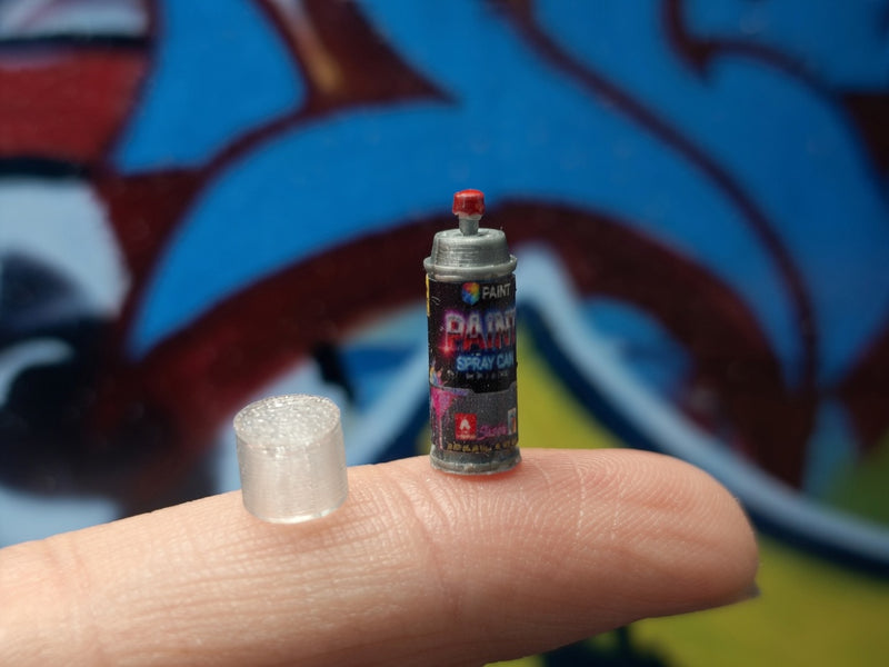 Red paint spray bottle easily brighten up your miniature displays.