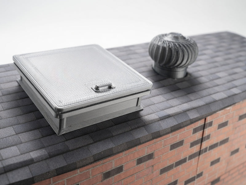The most compelling miniature scenes rely on interactive, functional details that mirror the real world. This artist-crafted roof hatch features a fully working hinge design, allowing the textured protective lid to swing open or closed.