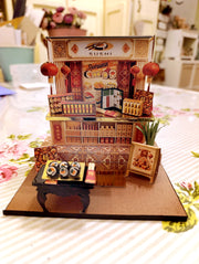 A 3D-printable STL file of a 1:12 scale Chinese New Year Lunar Fortune Cat stand DIY kit, featuring a detailed fortune cat on a stand for a dollhouse festive display

