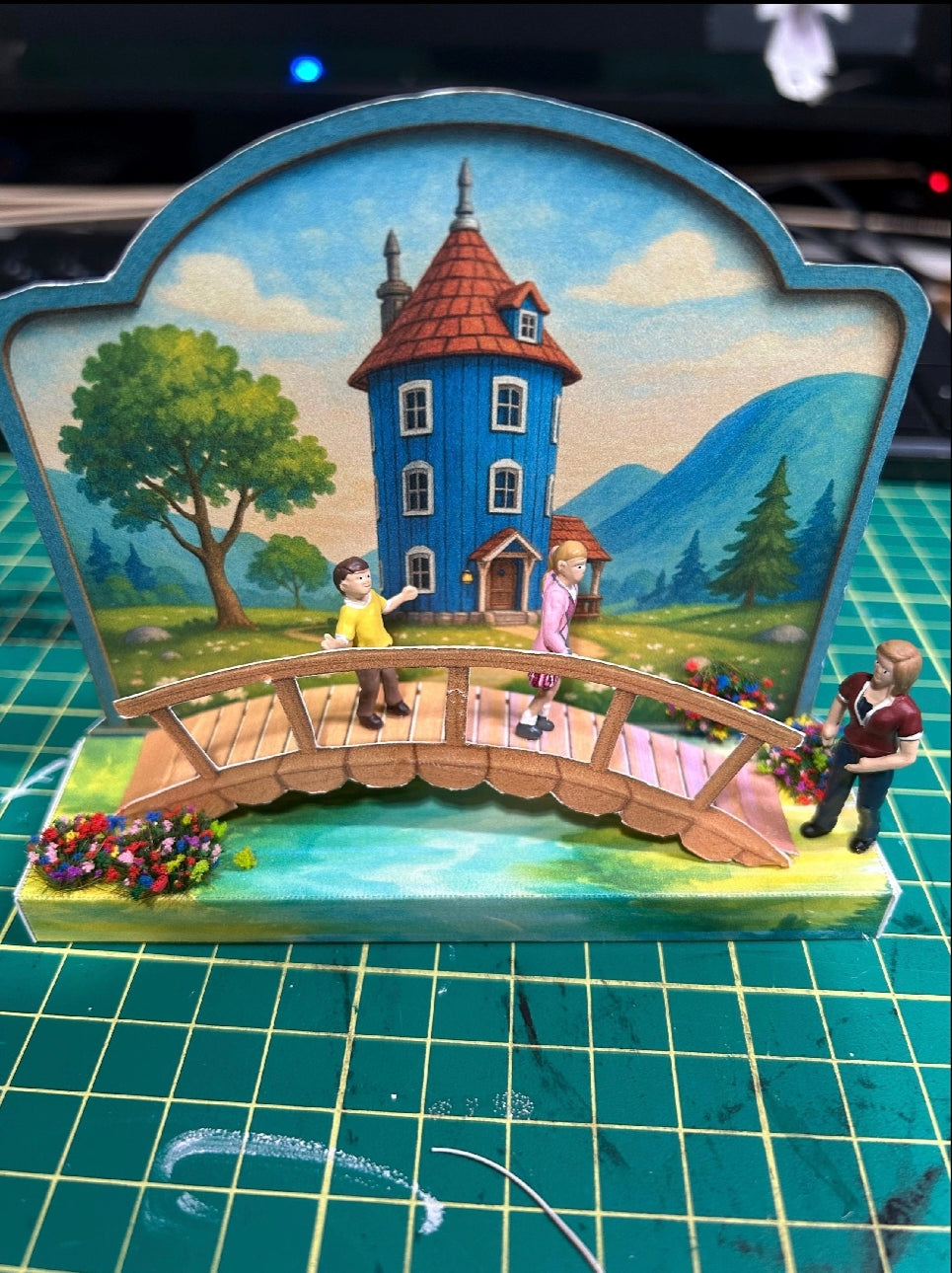A peaceful Valley Scene, bridge and river, a house and a home.